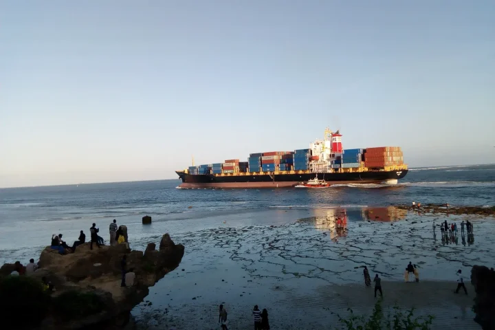 Container ship leaving port